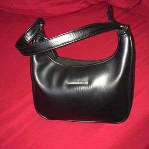 Black Hand purse. Compact cute